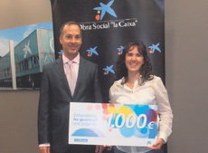       Director oficina 72-St. Feliu de Llobregat (Lluís Lázaro) i premiada (Pilar Ibáñez Navarro).