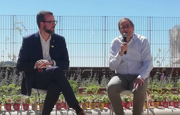 Jordi Bou -izquierda- junto a Quim Torra.