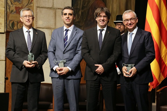 Baselga, Esteller i Massagué, acompanyats de Carles Puigdemont
