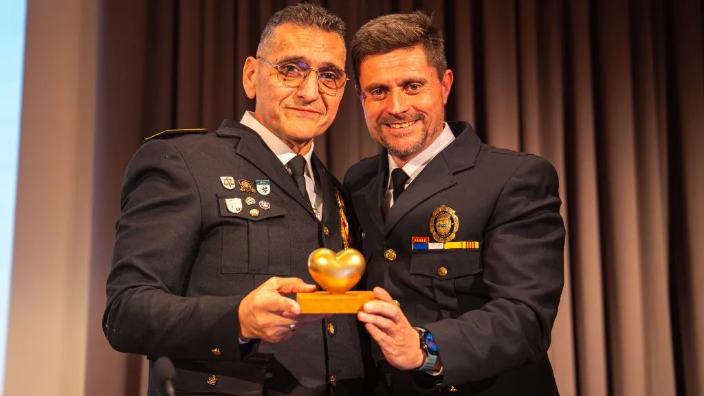 Xavier Muñoz y Sito Cano con el 'Cor d'or'